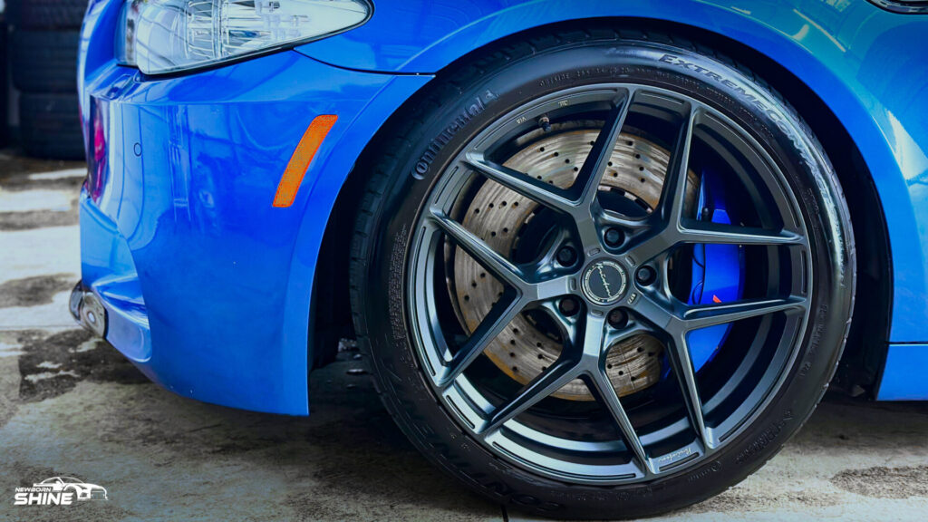 2016 Blue BMW M5 Auto Detailing - Driver Front Wheel Mid