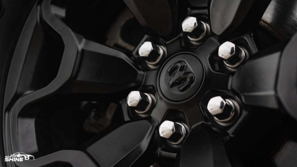 2022 Red RAM TRX Auto Detailing and Ceramic Coating - Passenger Front Wheel Logo Close